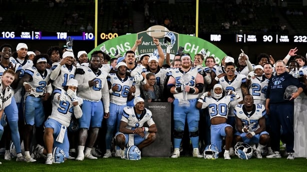 North Carolina offensive lineman Christo Kelly #56 and teammates celebrate after their side's victory in the 2026 Aer Lingus College Football Classic match between TCU and North Carolina at the Aviva Stadium in Dublin