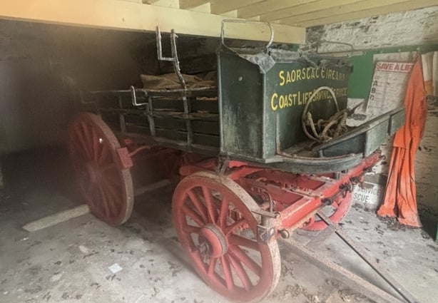 Red and green 'rocket car' in storage
