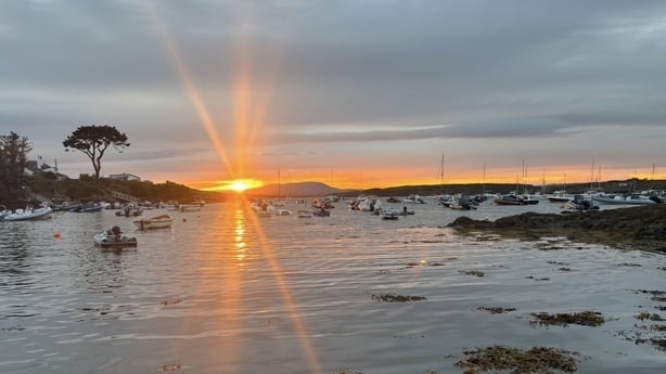 Setting sun over a cove