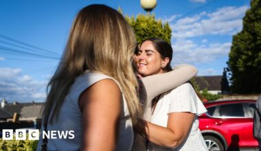 Vigil held for four people injured in M9 crash - BBC