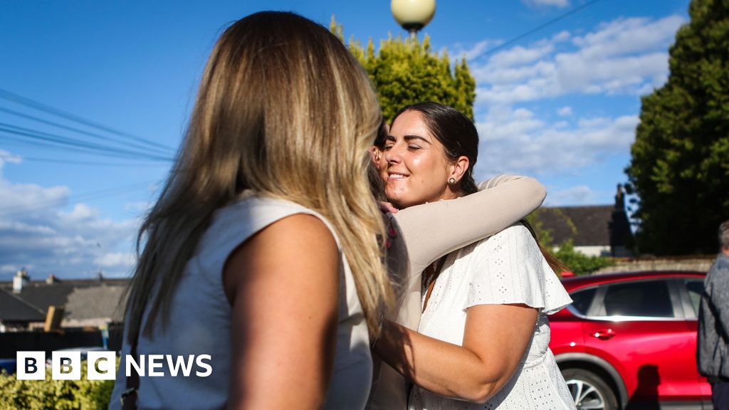 Vigil held for four people injured in M9 crash - BBC
