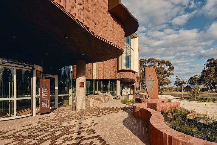 Stone and timber saved from the site complement a welcoming main arrival area.