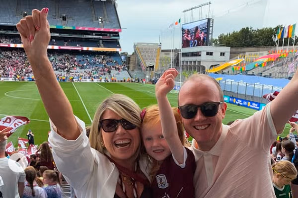 Ger Treacy, her husband Bernard and their daughter Kitty at Croke Park