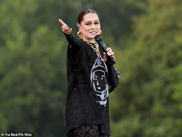 She added huge gold hoop earrings to her edgy black look as she took to the stage to perform her hits
