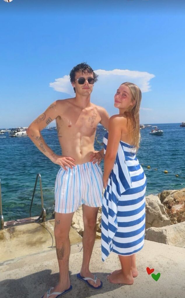 Victoria Beckham gushed over her close knit family as she revealed she is 'making memories with special people' on her European summer holiday (pictured Cruz and Harper)