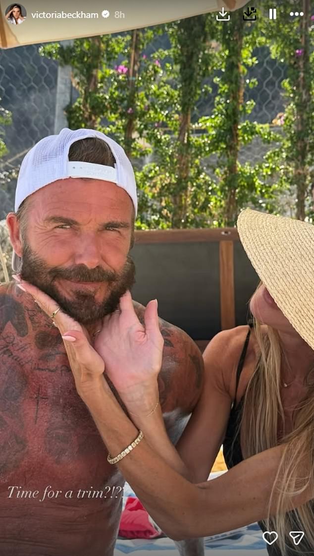 Among them was a picture of herself showing off her husband David's holiday beard, holding his overgrown facial hair and joking it 'needed a trim'