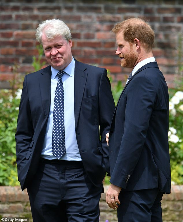 Earl Spencer and Prince Harry, Duke of Sussex, at the unveiling of a statue of Princess Diana in 2021