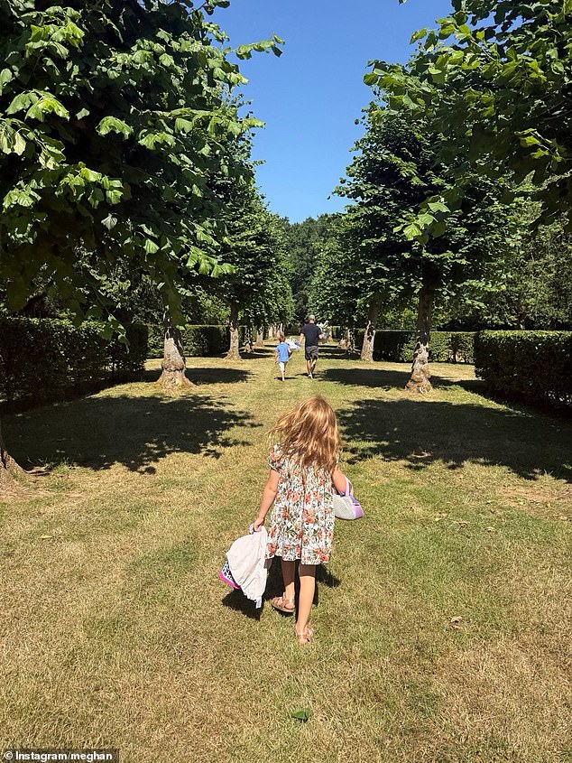 Prince Harry with Princess Lilibet and Prince Archie at what is believed to be Althorp House