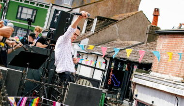 Nick Cave And The Bad Seeds perform surprise gig on roof of Brighton record shop