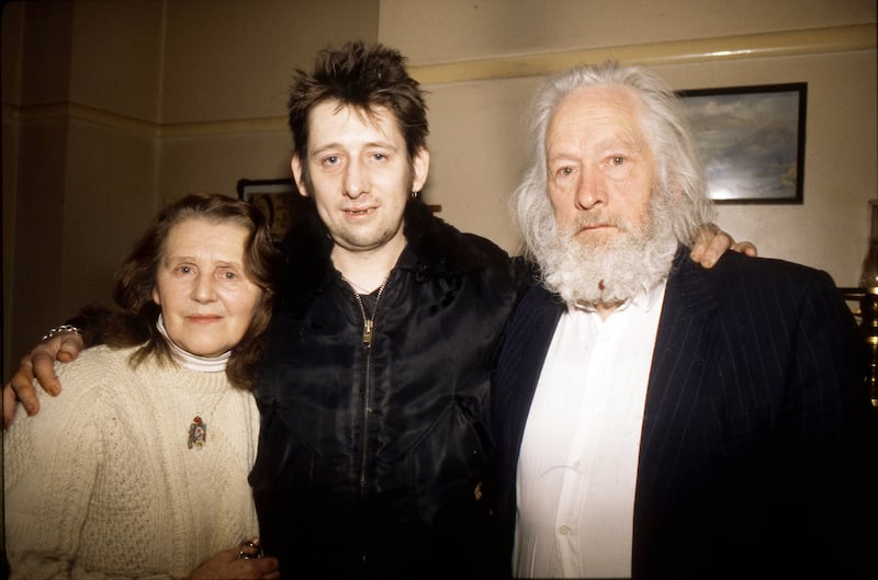Shane MacGowan (centre) with his mother Therese and father Maurice at the family home in Nenagh, Co Tipperary, in 1997. Photograph: Martyn Goodacre/Getty Images