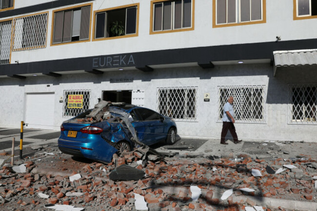debris-covers-a-car-after-an-earthquake-struck-cali-colombia-monday-aug-10-2026-ap-photosantiago-saldarriaga
