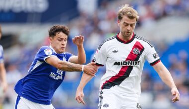Alex Robertson of Cardiff City challenges Patrick Bamford of Sheffield United