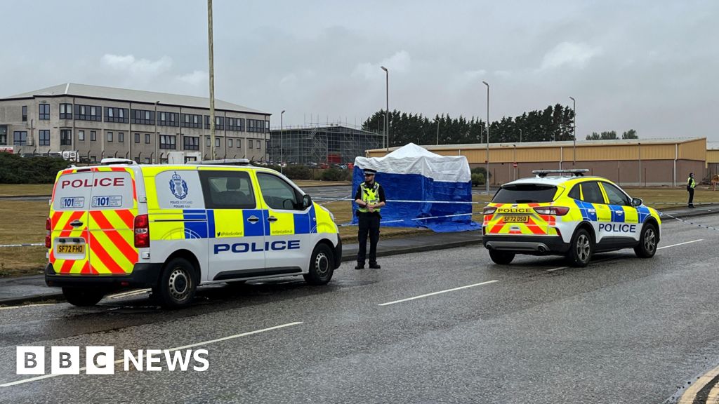 Man arrested after death of nine-year-old girl found injured in industrial estate - BBC