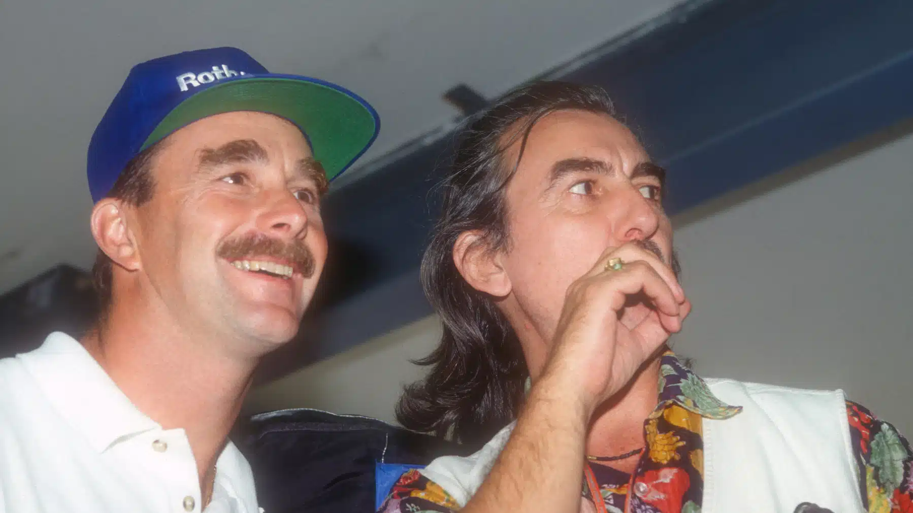 Nigel Mansell (Williams-Renault) and George Harrison (The Beatles) in the pits before the 1994 Australian Grand Prix