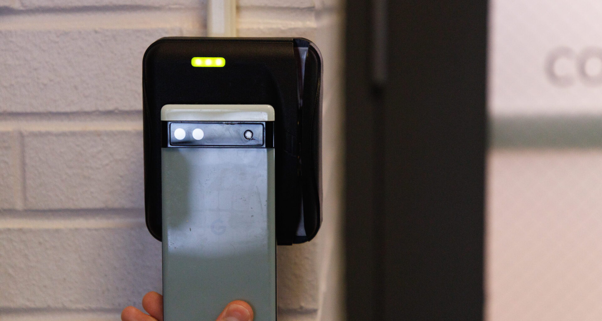 A student uses their digital BuckID to unlock a door on campus (Posed). Credit: Michael Goulet