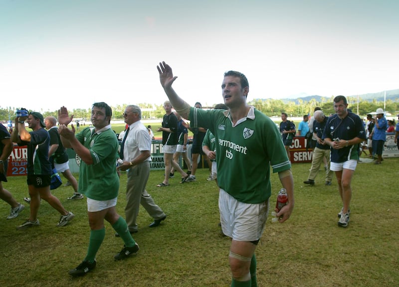 Paul Shields (left) and Aidan McCullen wave to the crowd after Ireland's clash with hosts Samoa in 2003. Photograph: Billy Stickland/Inpho