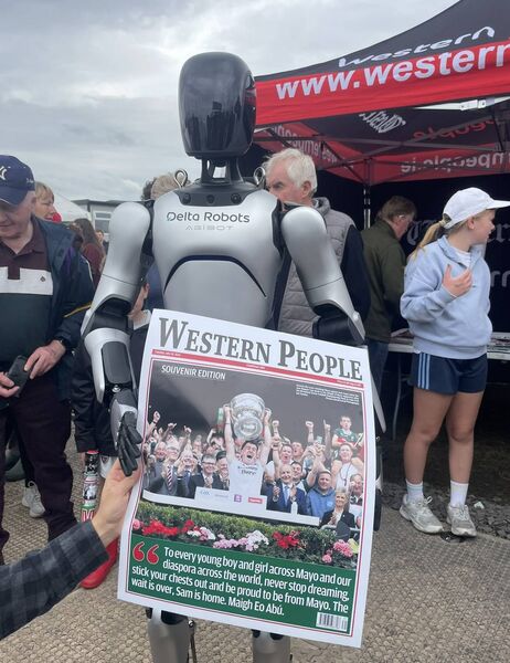 The humanoid robot A2 proved a big attraction at Bonniconlon Show. It event managed to go home with a copy of the Western People's All-Ireland final souvenir front page. 