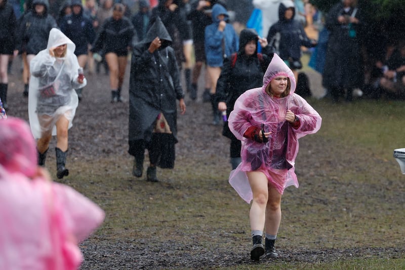 Electric Picnic: Festivalgoers brave the rain in Stradbally on Saturday. Photograph: Nick Bradshaw/The Irish Times