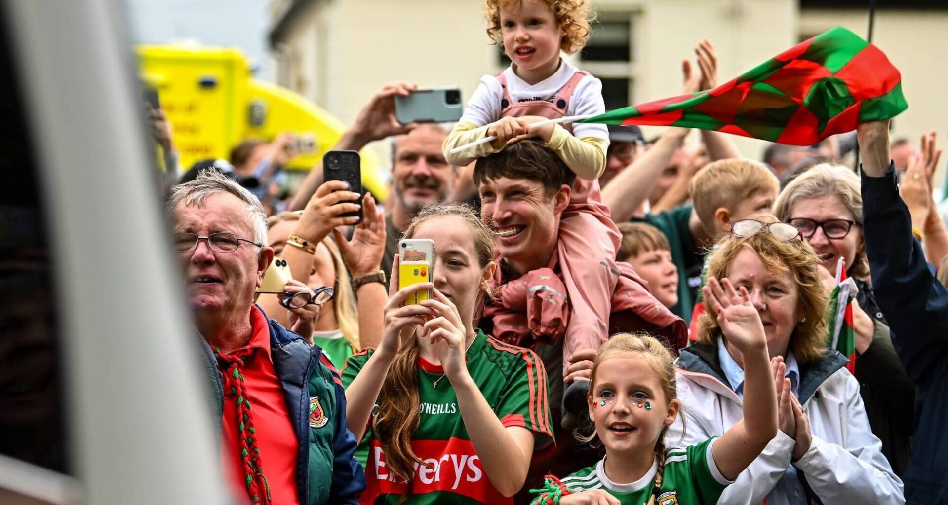 READY TO BURST: Supporters cheer the Mayo team bus on the way to the homecoming celebrations at MacHale Park in Castlebar. Picture: Piaras Ó Mídheach/Sportsfile