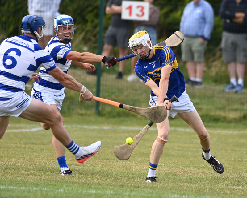 Carrigtwohill's Matthew Barrett shoots from Inniscarra's Con O'Leary and Sean O'Donoghue. Picture: Eddie O'Hare