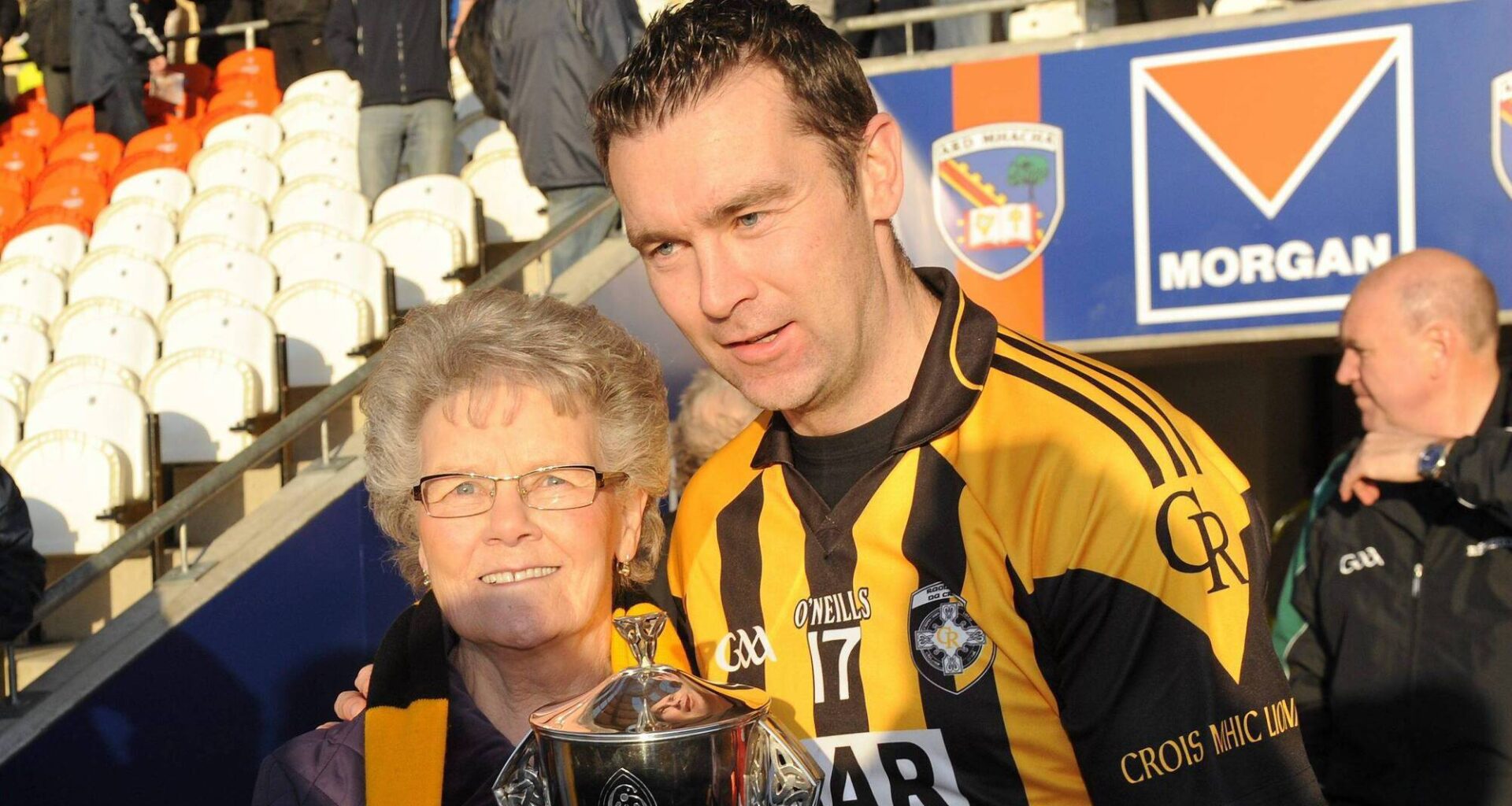 Oisin McConville celebrates with his mother Margaret McConville after Crossmaglen Rangers won the 2011 Armagh SFC final. Pic: Oliver McVeigh / SPORTSFILE