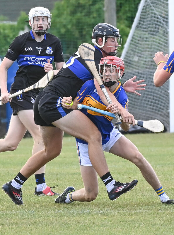  Carrigtwohill's Darragh Horgan is tackled by Sarsfields' Tom O'Flynn during their Premier 1 MHC clash at Carrigtwohill. Picture: David Keane