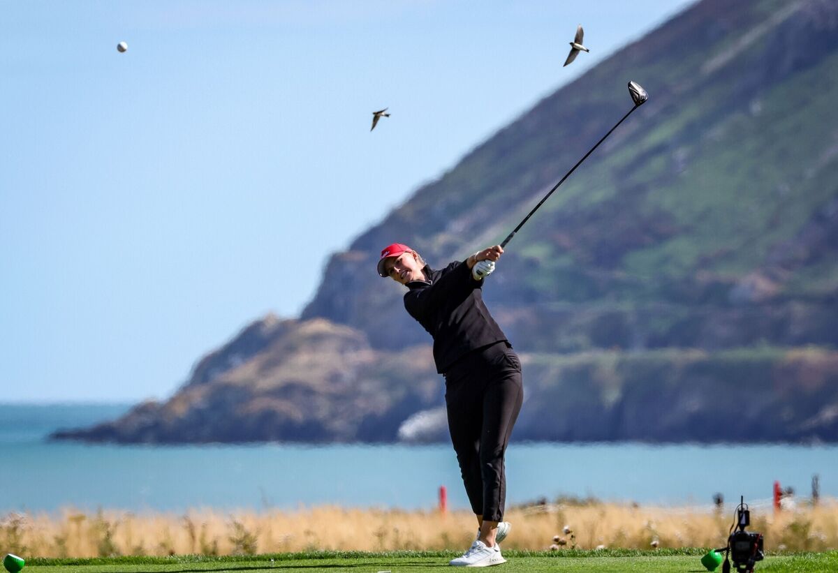 Birds fly over Wales’ Emily James as she tees off on the 6th. Pic: ©INPHO/Dan Clohessy.