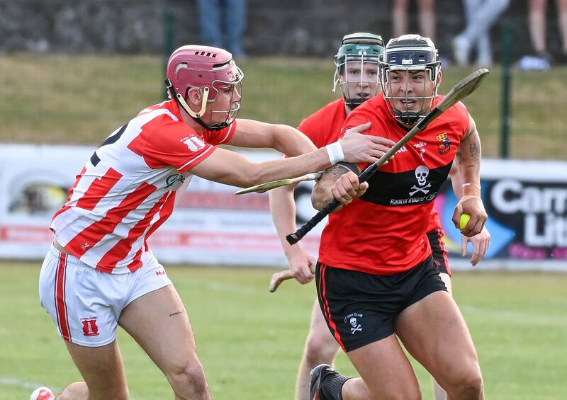 Imokilly's Conor Cahill tackles UCC's James Dwyer during their Divisions/Colleges Premier SHC clash at Midleton. Picture: David Keane.