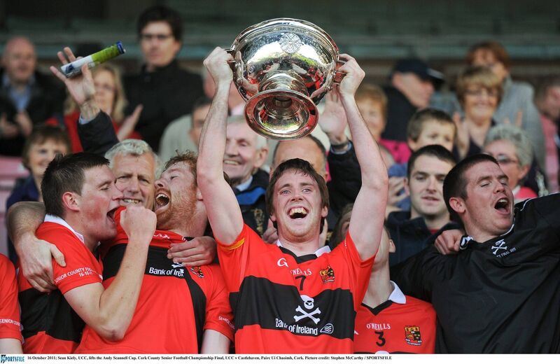 Seán Kiely of UCC lifts the Andy Scannell Cup in 2011. Picture: Stephen McCarthy/Sportsfile