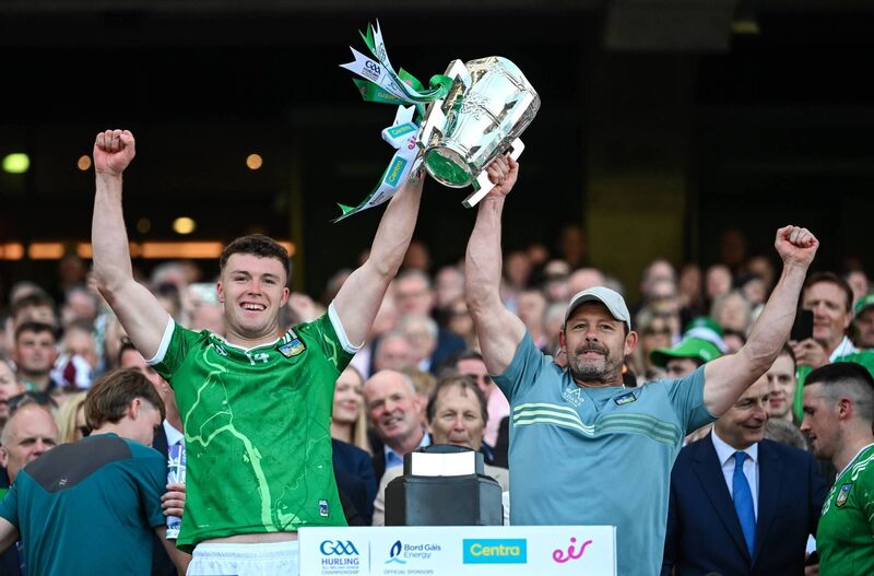 Limerick's Shane O'Brien and Adrian O'Brien lift the Liam MacCarthy Cup. Pic: Stephen McCarthy/Sportsfile