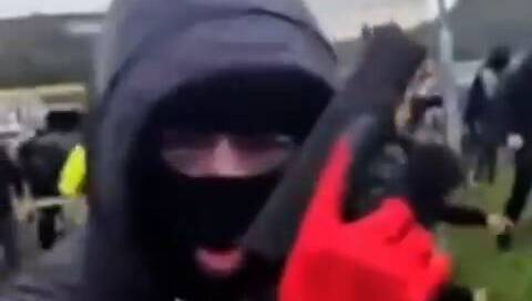 More than 40 masked men, armed with guns, slash hooks, wooden bats and iron bars, gathered in Limerick in apparent preparation to fight.