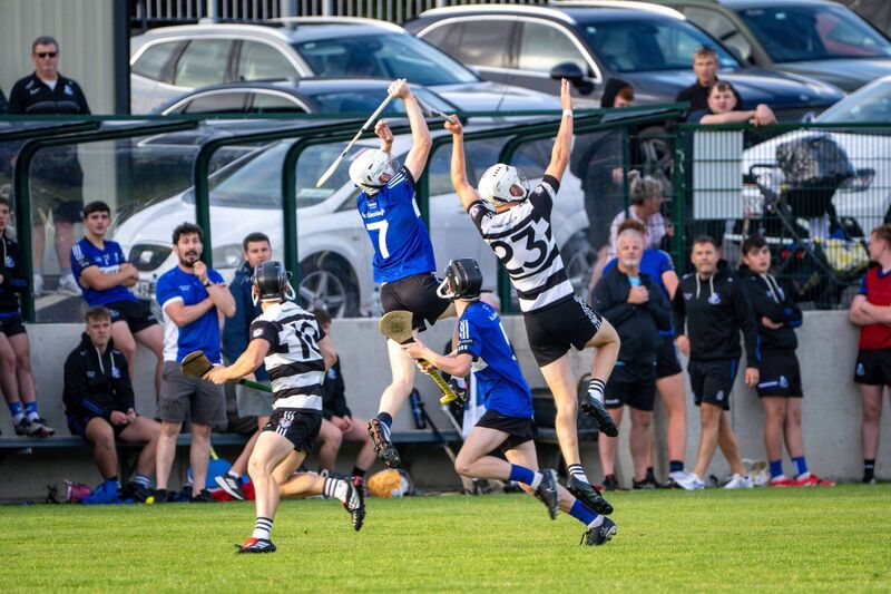 Midleton’s Shane O’Mahony and Sars' Darragh Pomeroy battle for possession in the air. Picture: Chani Anderson