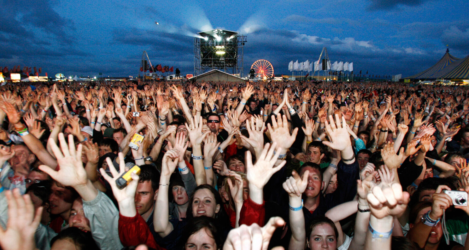 The crowd cheer on Snow Patrol playing on the Main Stage at Oxegen 2007. Picture: Mark Stedman