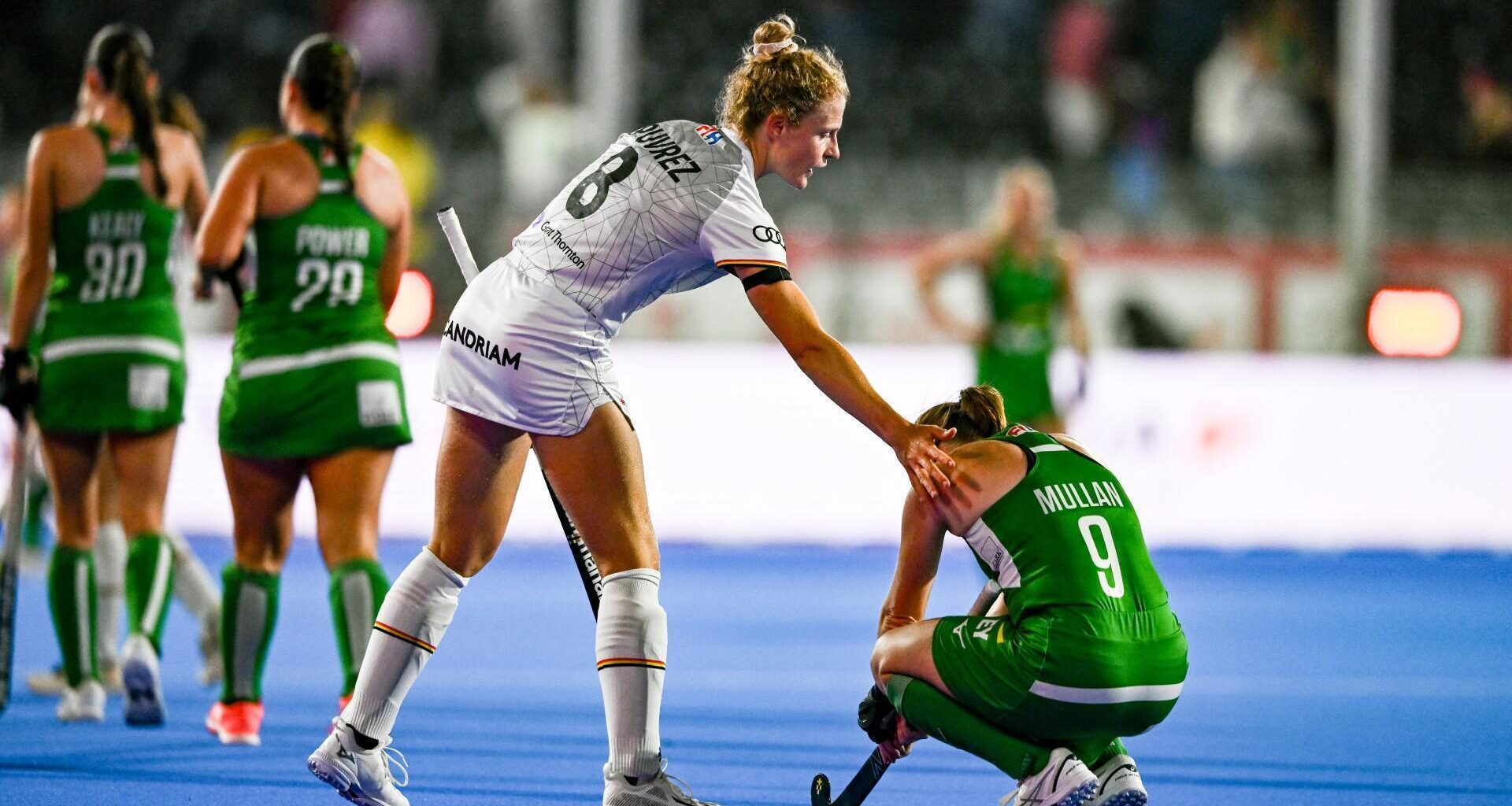Kathryn Mullan of Ireland is consoled by Emma Puvrez of Belgium. Pic: Ben McShane/Sportsfile
