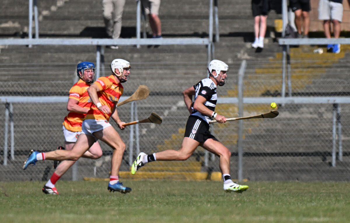  David Cremin about to hit the winning point for Midleton against Newcestown. Picture: Larry Cummins
