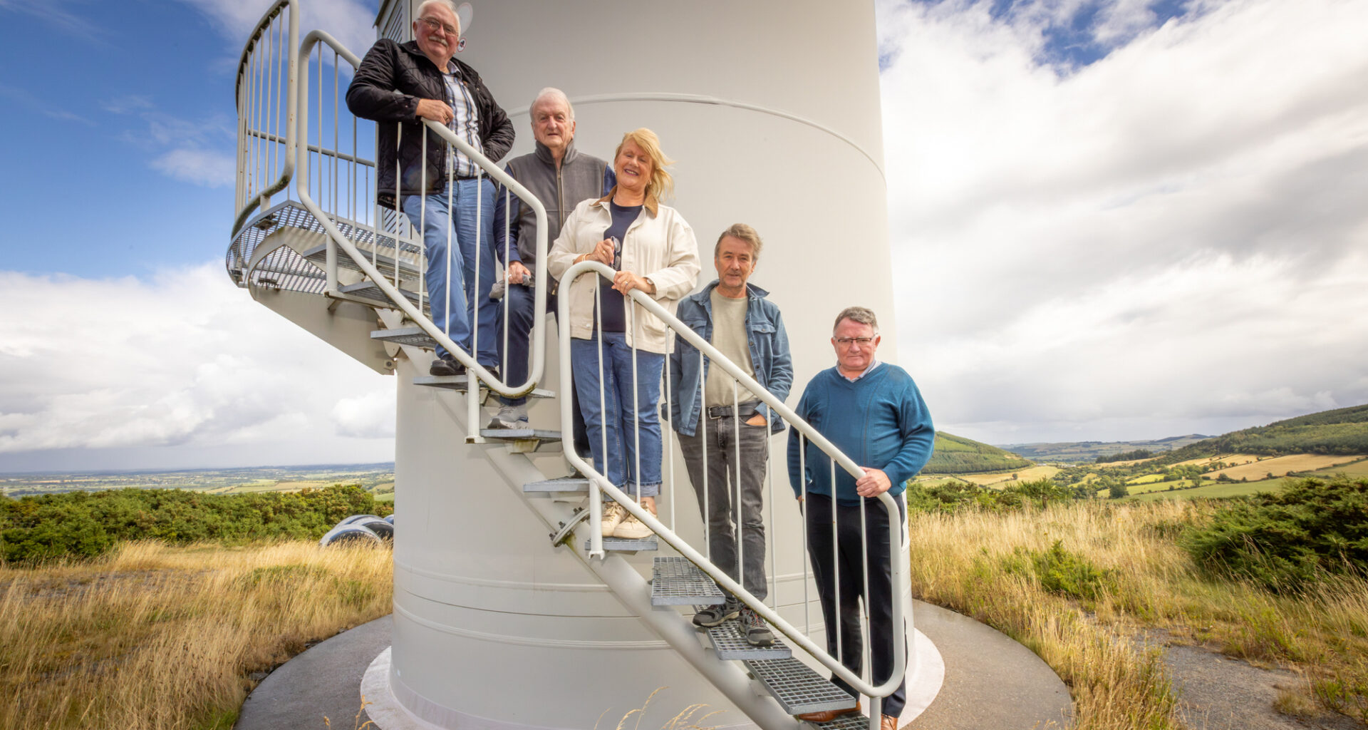 Shareholders of Ireland's first and (so far) only community-owned wind farm in Templederry, Co Tipperary — Matt Murray, John Fogarty, Carmel O'Donoghue, Gregg Allen, and Noel Carey. Mr Fogarty said: 'The system is very much weighted in favour of the big companies.' Picture: Neil Michael