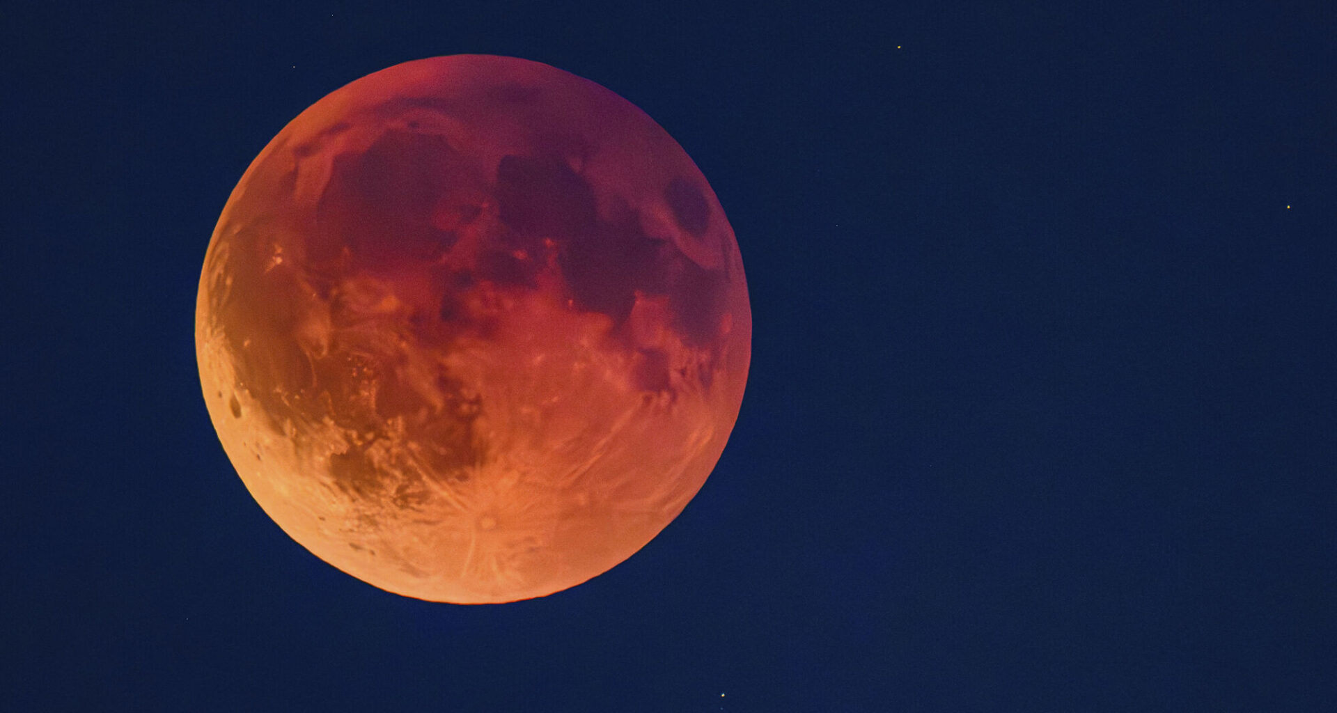 The moon is likely to glow a muted coppery red colour later this week. Picture: Patrick Pleul/dpa via AP