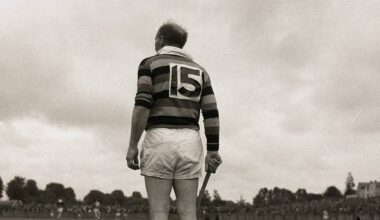 GLEN MAN: Christy Ring stands to attention for the national anthem prior to the Glen Rovers V UCC quarter-final game at the Athletic Grounds. This was Christy’s 27th season in the Glen Rovers jersey – and was to be his last game of hurling! Even though Glen Rovers won the match, Christy retired from the game he had graced for so long. Picture: Kevin Cummins