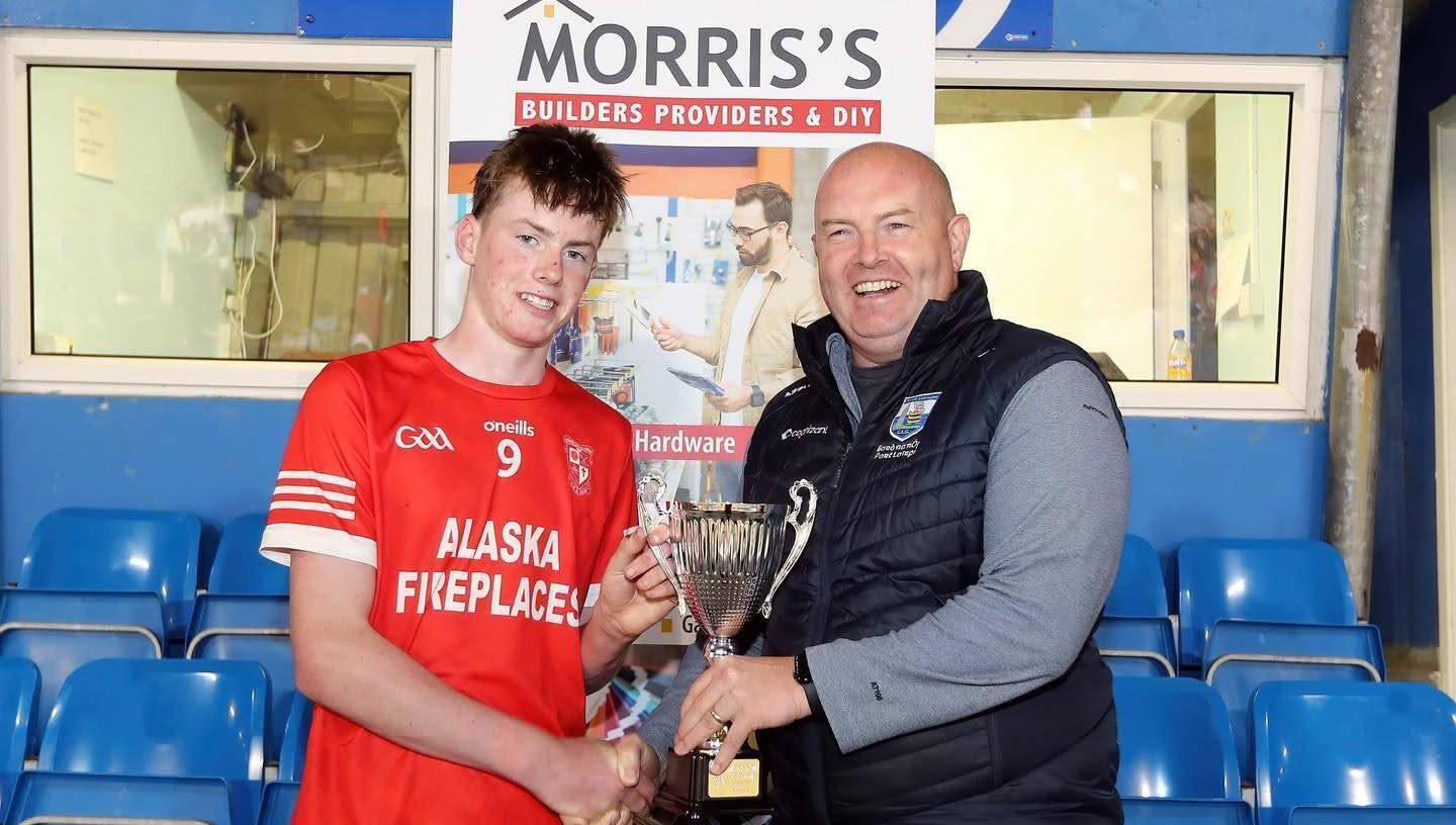 Brendan Breen was in Fraher Field on Monday night to see Stradbally U16 hurlers win the Division 1A trophy and present the trophy to the winning Stradbally captain Gearóid Power.