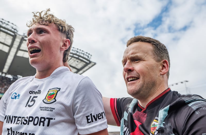 Mayo's Kobe McDonald and manager Andy Moran celebrate after last Sunday's All-Ireland SFC final victory against Kerry at Croke Park. Photograph: James Crombie/Inpho