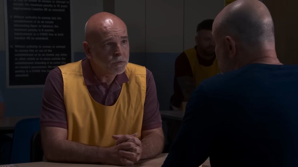 Coronation Street, Richie and Tim coronation street, richie and tim sat opposite each other at a table in the prison visiting room, with richie wearing a yellow prisoner vest