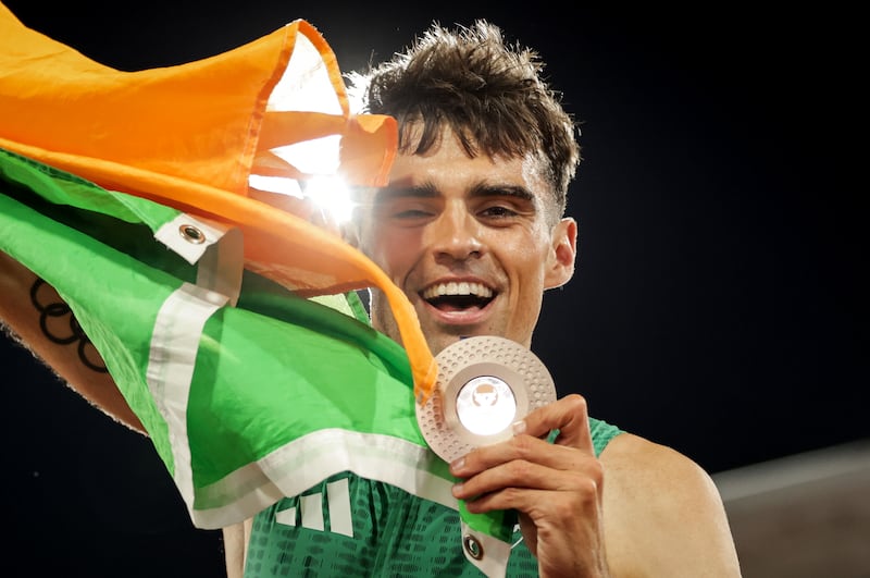 Andrew Coscoran celebrates winning bronze on Saturday in the men's 1,500m final at the European Athletics Championships in Birmingham. Photograph: Morgan Treacy/INPHO