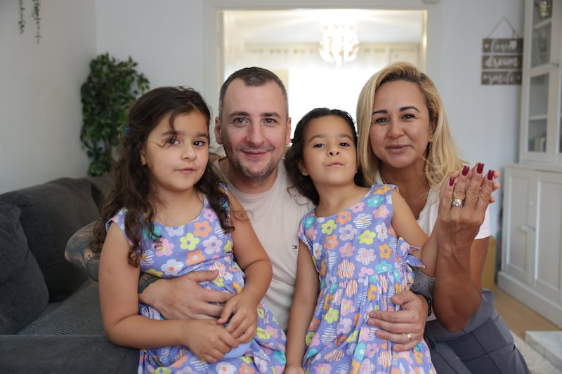Cristian Pistea and his wife Ana Carolina Rodrigues Pimentel with their twin daughters Maria Giovanna and Maria Cristianna Pistea Rodrigues. Photograph: Enda O'Dowd