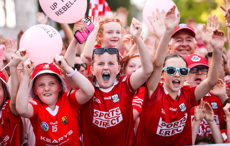 Young Cork supporters celebrate during the homecoming event. Photograph: Tom Maher/Inpho