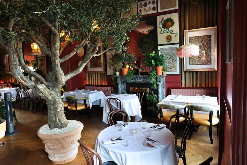 The decor in the room upstairs creates a sense of Italian warmth. Photograph: Dara Mac Dónaill
