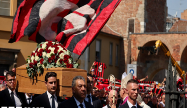 Pallbearers carry the coffin outside the Basilica of Sant'Ambrogio during the funeral of former AC Milan and Italy soccer player Franco Baresi