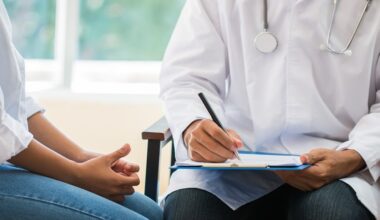 cancer survivor patient having consultation with psychiatrist survivorship