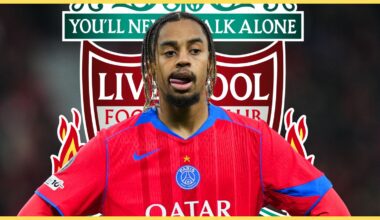 Bradley Barcola licks his lips in front of Liverpool club crest.