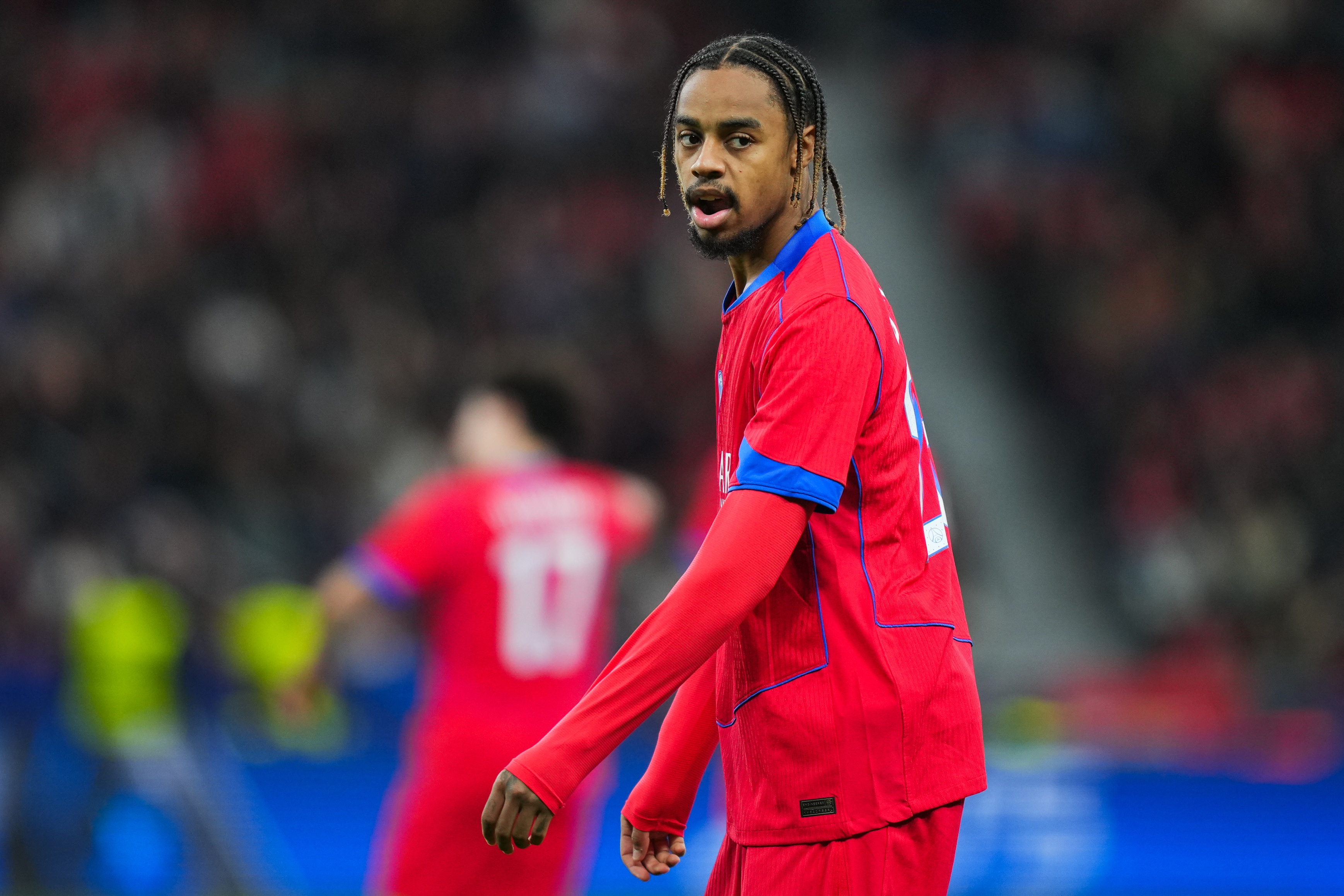 Liverpool transfer target Bradley Barcola looks over his left shoulder during PSG game.