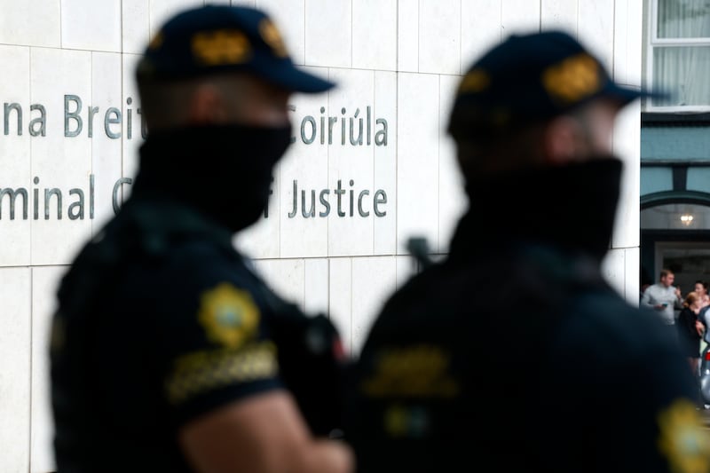 Armed gardaí outside the Special Criminal Court in Dublin on Sunday evening. Photograph: Conor Ó Mearáin/Collins